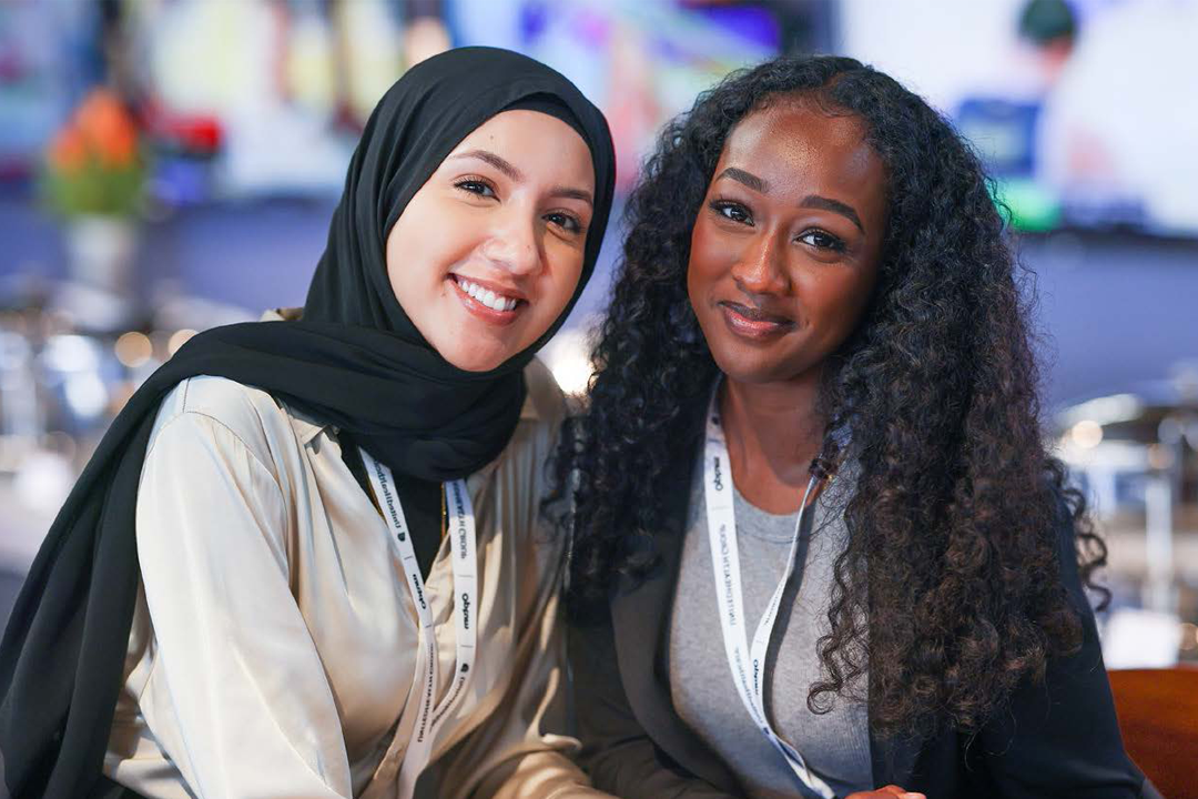 Two women smiling