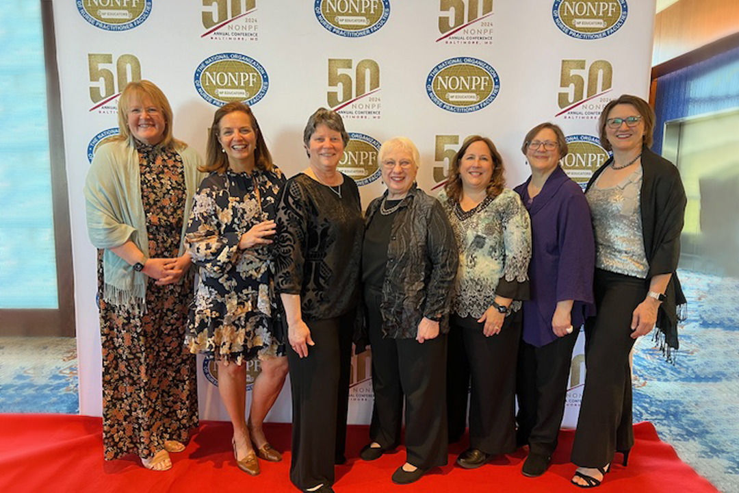 GW Nursing faculty posing in a group at the 2024 NONPF Annual Conference