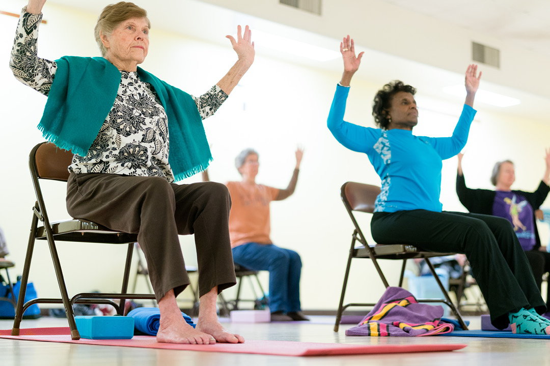 Senior citizens doing yoga