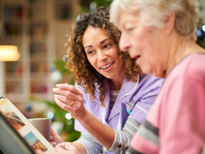 nurse helping dementia patient