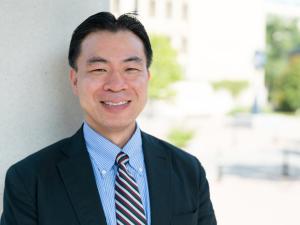 Tony Yang outside in Foggy Bottom Campus