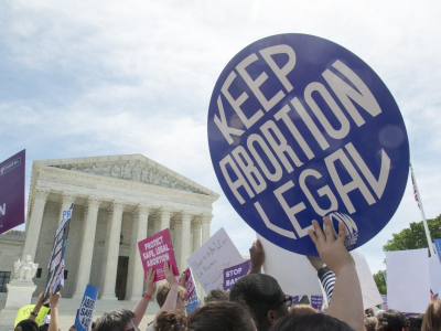 Protesters demonstrate outside the Supreme Court