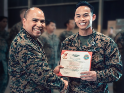 Jeffrey Kai receiving certificate