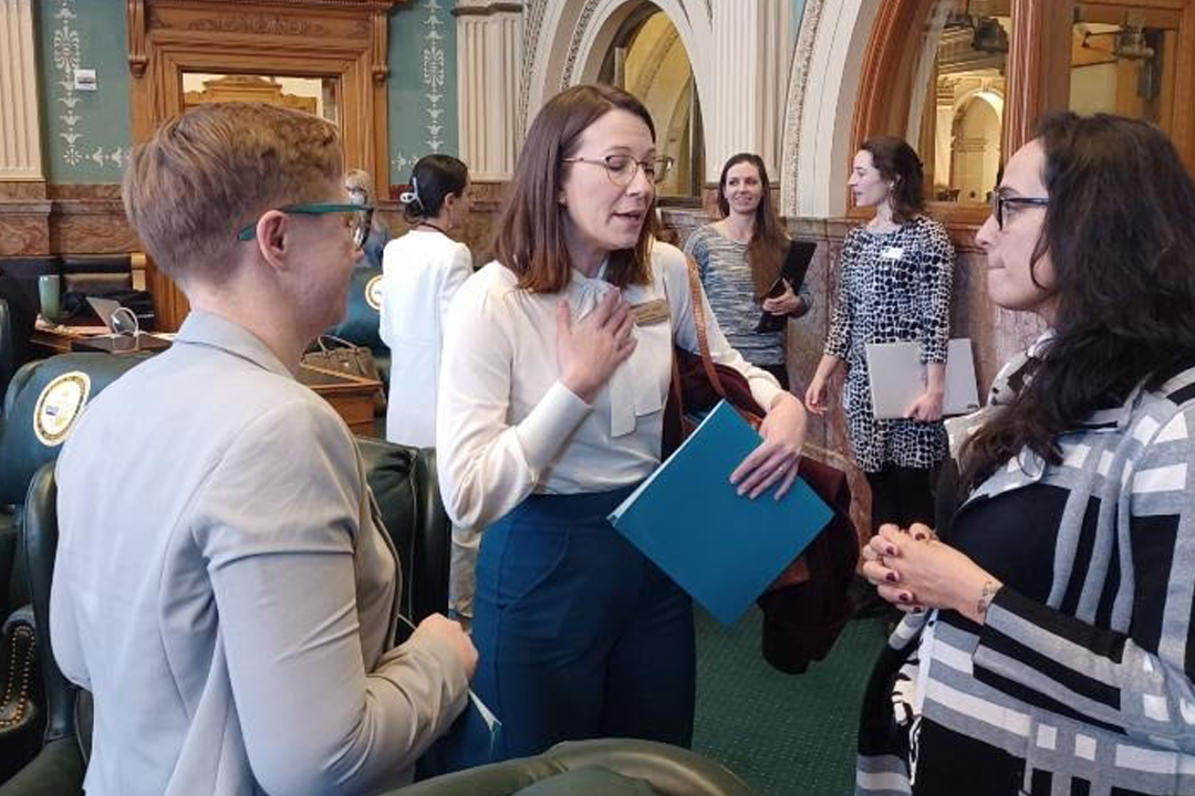 Ashley Fry on floor of Colorado State House
