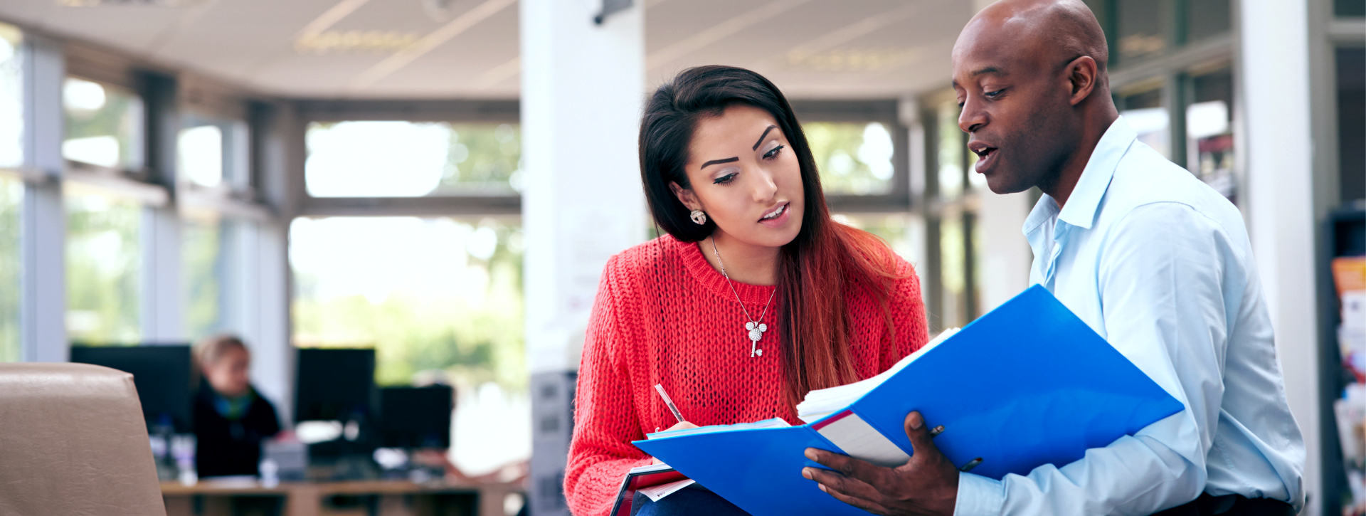 Academic advisor working with student